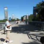 There were alot of people walking, sometimes running, sometimes cycling on the bridge.